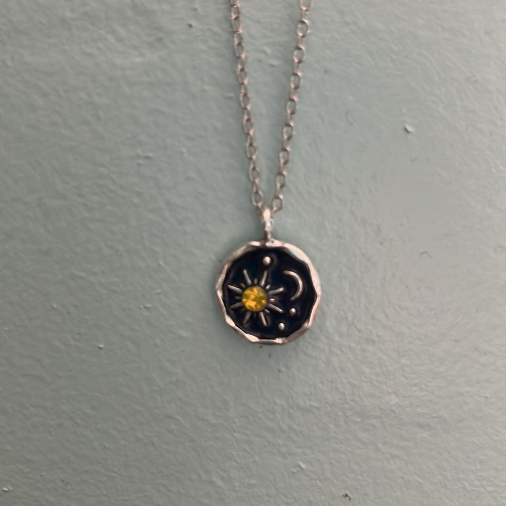 Small shining sun in the night sky pendant necklace